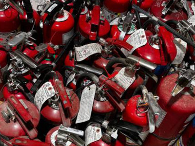 red fire extinguishers clustered together