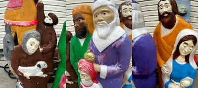 three pictures of a full plastic nativity set